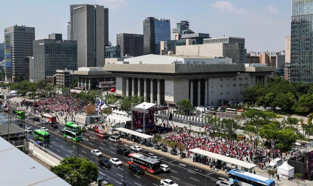 Supporters cheer while watching South Koreas Group A match against the Czechia Republic during a public viewing event for the 2026 FIFA World Cup at Gwanghwamun Square in Seoul on June 12 AJP Yoo Na-hyun

