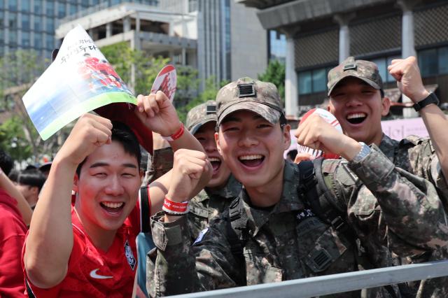 Supporters cheer while watching South Koreas Group A match against the Czechia Republic during a public viewing event for the 2026 FIFA World Cup at Gwanghwamun Square in Seoul on June 12 AJP Yoo Na-hyun

