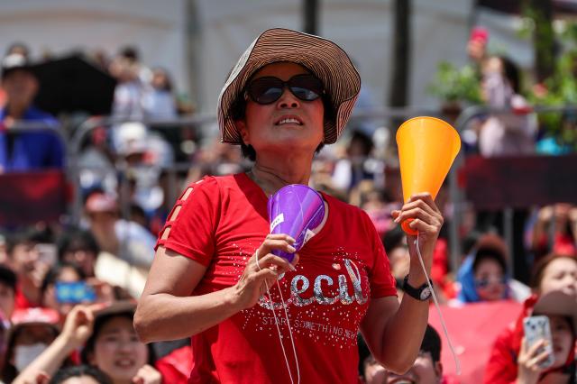 Supporters cheer while watching South Korea's Group A match against the Czechia Republic during a public viewing event for the 2026 FIFA World Cup at Gwanghwamun Square in Seoul on June 12. AJP Yoo Na-hyun

