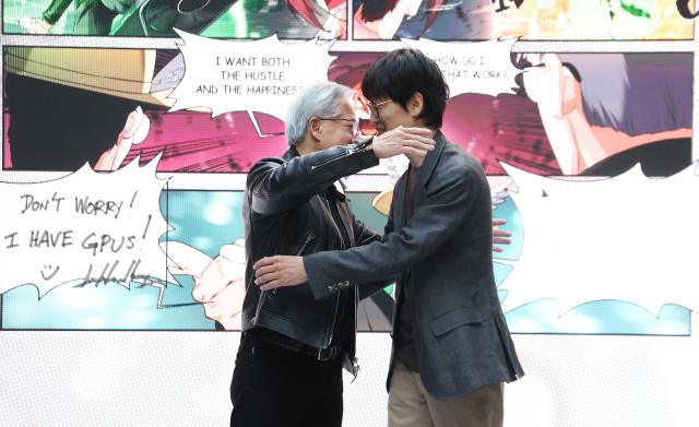 Nvidia CEO Jensen Huang L greets Naver Chairman Lee Hae-jin during his visit to Navers 1784 headquarters in Seongnam Gyeonggi Province on June 8 2026 Yonhap