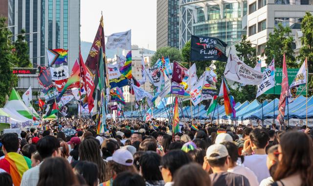 Participants take part in the 27th Seoul Queer Parade near Euljiro 1-ga Station in central Seoul on June 13, 2026. 


