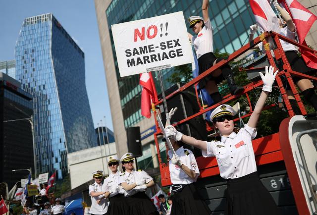Protesters attend a rally opposing the Seoul Queer Parade near Euljiro 1-ga Station in central Seoul on June 13 2026 
