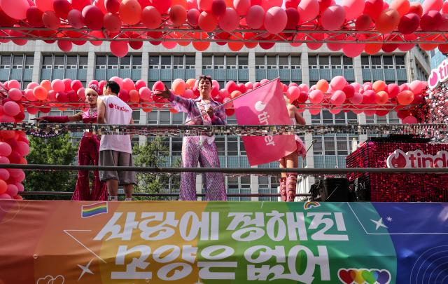 Participants take part in the 27th Seoul Queer Parade near Euljiro 1-ga Station in central Seoul on June 13 2026 

