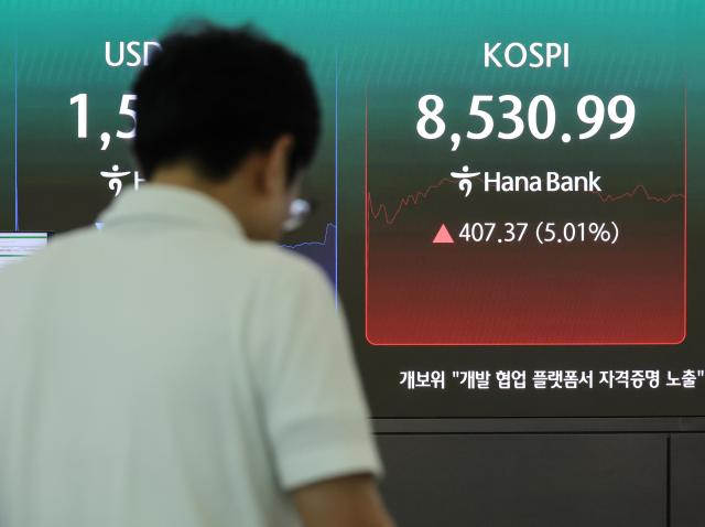 Market indicators including the KOSPI are displayed on an electronic board at the dealing room of Hana Bank in Jung District central Seoul on June 15 AJP Yoo Na-hyun
