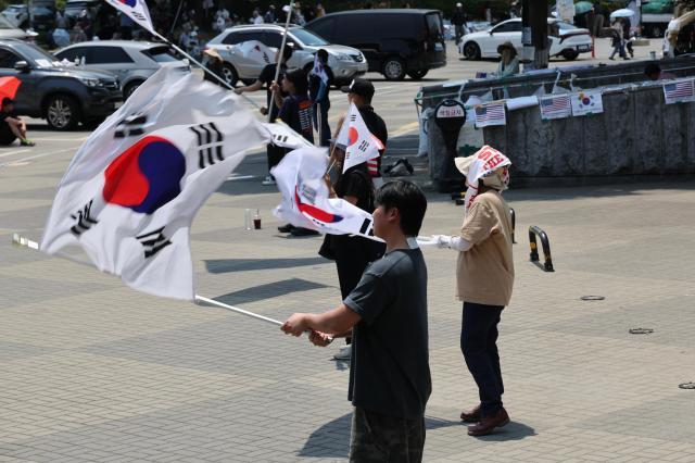 Protesters continue a blockade demonstration outside the Olympic Handball Gymnasium in Seouls Olympic Park on June 16 denouncing ballot shortages reported during South Koreas June 3 local elections AJP Yoo Na-hyun


