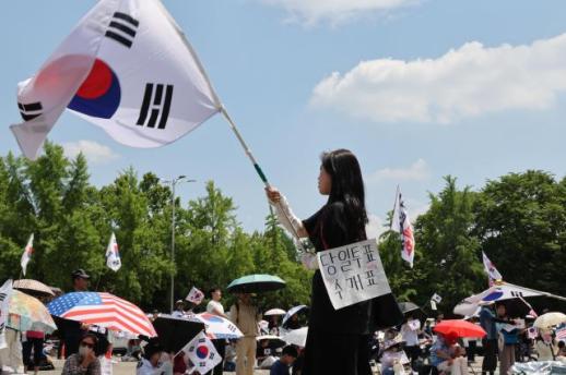 South korean flag waved in election protest