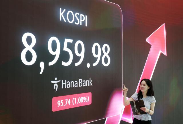KOSPI runs toward new threshold of 9,000, Nikkei hits fresh high