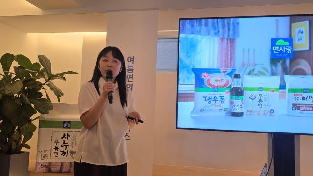Kim Mi-ra, head of communications at Myeonsarang, introduces the company's summer noodle competitiveness and noodle-making technology at the Media Day held in Insadong, Jongno-gu, Seoul, on June 18. [Photo by Kim Hyun-a]