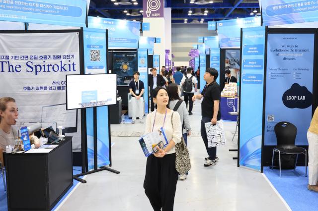 Visitors explore startup booths at NextRise 2026 Seoul Asia’s largest startup fair held at COEX in Seoul on June 18 as companies showcase their latest innovations in AI biotech and digital healthcare AJP Han Jun-gu