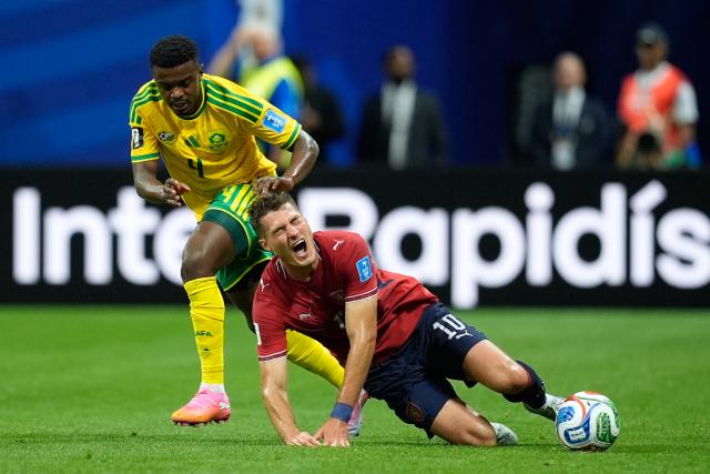 Czechias Patrik Schick falls to the ground in a clash with South Africas Teboho Mokoena left during the World Cup Group A soccer match between Czechia and South Africa in Atlanta Thursday June 18 2026 Courtesy of AP  Yonhap News Agency