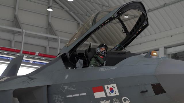 Maj Song Min-seok a South Korean Air Force KF-21 test pilot prepares for a flight in the cockpit of a KF-21 at a hangar on April 22 2026 Courtesy of ROK Air Force