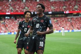 Canada Secures First World Cup Victory with 6-0 Win Over Qatar
