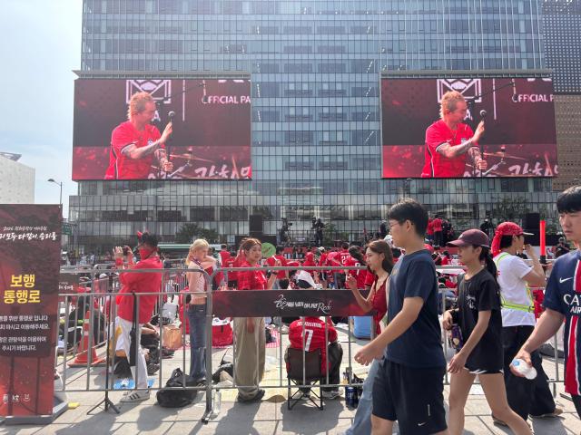 Fans dressed in red gather at Gwanghwamun Square in Seoul to cheer for South Korea during 2026 FIFA World Cup on June 19 2026 AJP Ryu Yuna