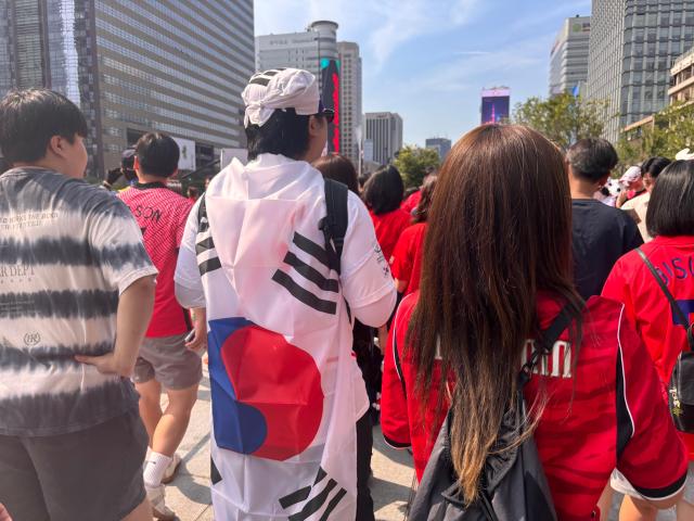 Fans dressed in red gather at Gwanghwamun Square in Seoul to cheer for South Korea during 2026 FIFA World Cup on June 19 2026 AJP Ryu Yuna