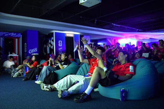 Fans watch South Korea’s second Group A match against Mexico at the 2026 FIFA World Cup while drinking Cass beer an official tournament sponsor at the Cass FIFA World Cup Fan Basecamp in Gangnam-gu Seoul on June 19 AJP Joonha Yoo