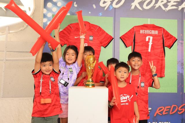 South Korean football fans cheer while watching the Group A match between South Korea and Mexico at a public viewing event at Hangang Play Place in Ttukseom Hangang Park in Seoul on June 19 2026 during the 2026 FIFA World Cup AJP Han Jun-gu
