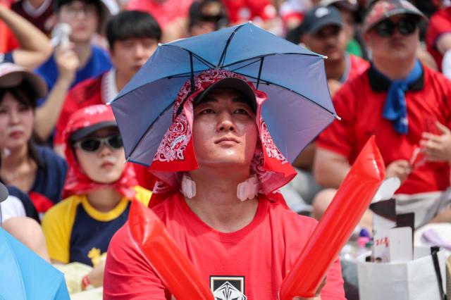 A fan shows off ingenuity to stay out of cold while cheering for the  Team Korea during the match with Mexico for FIFA World Cup on June 19 2026 AJP Yoo Na-hyun