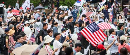 Protesters rally against ballot shortages