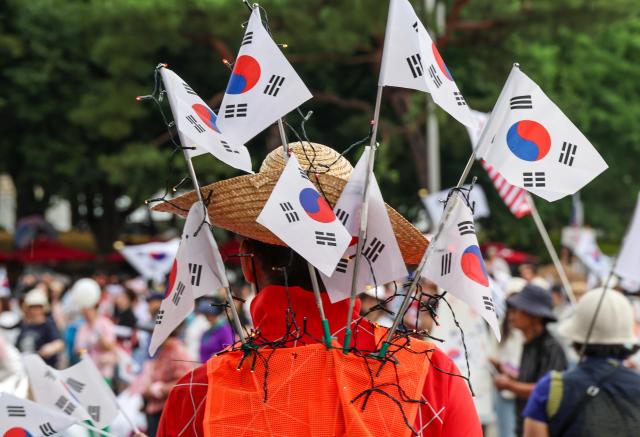 Demonstrators rally against election issues