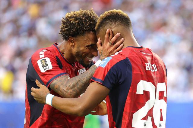 Cape Verdes Helio Varela right celebrates with Ryan Mendes after scoring the equalizer during a Group H match against Uruguay at Miami Stadium in Miami Gardens Florida on June 21 2026 APYonhap