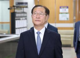 Ex-justice minister sentenced to 25 years in martial law-related case