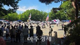 Woman Arrested for Spitting on Police at Jamsil Counting Center Protest