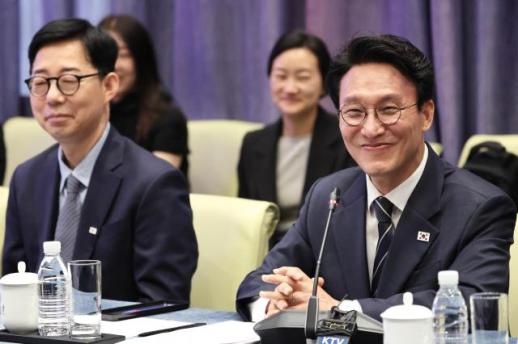 清华校友金民锡到访母校