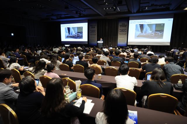 A forum on wireless backdoor attacks takes place at the Personal Information Security Fair  CPO Workshop held at COEX in Seoul on June 23 2026 AJP Han Jun-gu