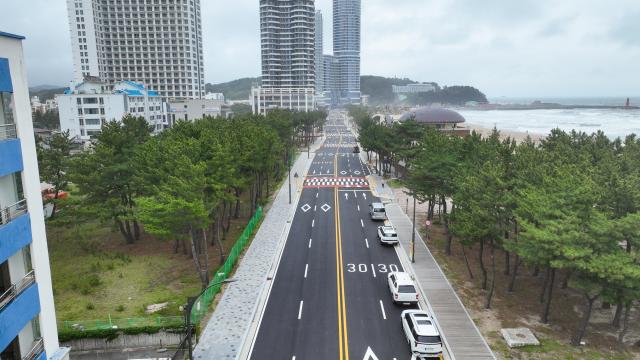 ‘주청리 군관리계획시설도로 중로1류 확포장공사’ 완료 사진양양군