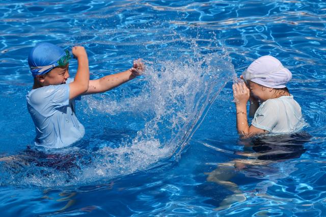 Citizens and foreign tourists cool off at the Yeouido Hangang Park swimming pool in Seoul on June 23 as hot summer weather continues AJP Yoo Na-hyun
