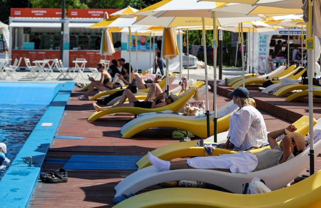 Citizens and foreign tourists cool off at the Yeouido Hangang Park swimming pool in Seoul on June 23 as hot summer weather continues AJP Yoo Na-hyun
