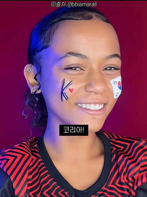 This photo captured from Youtube shorts page show bbiamarall singing along the South Korea world cup 2026 song 