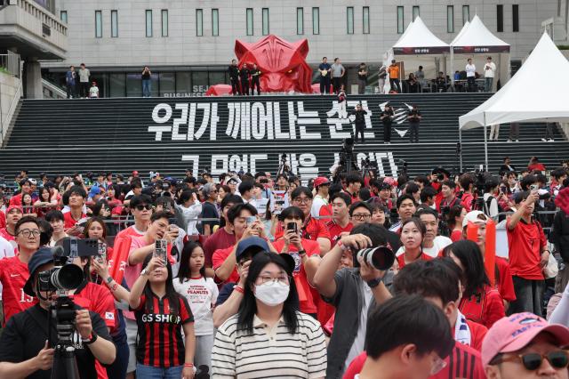 Football fans gather before a big screen across Sejong Arts Center  in Gwanghwamun downtown Seoul to watch the make-or-break Group A FIFA World Cup 2026 match versus South Africa on June 25 2026 AJP Yoo Na-hyun