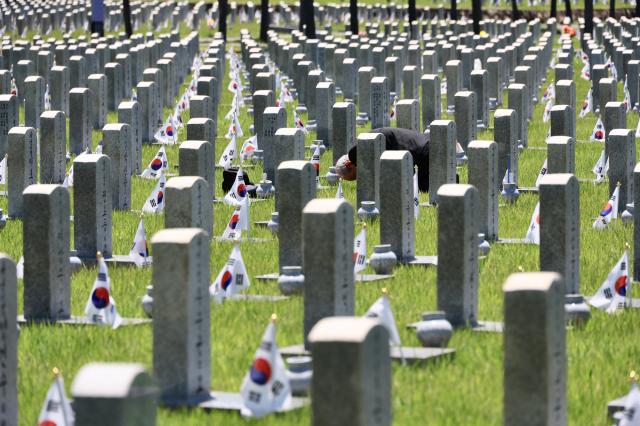 A visitor pays their respects at Seoul National Cemetery in Dongjakdong Dongjak-gu Seoul on June 23 2026 AJP Han Jun-gu