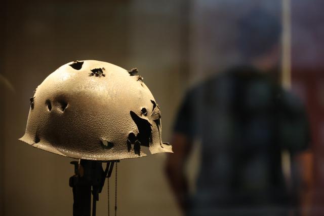 A bullet-pierced helmet is displayed at the War Memorial of Korea in Yongsan-gu Seoul on June 23 2026 AJP Yoo Na-hyun