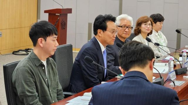 Gyeonggi Province Superintendent-elect Ahn Min-seok second from left speaks at a forum on education activity protection at the National Assembly Members Office Building in Seoul on June 25 2026 AJP Lee Jung-woo