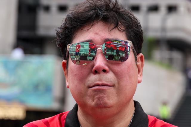 Cheers turn into groans at Gwanghwamun after World Cup defeat