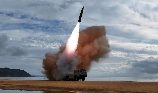 A missile is being fired from a multiple rocket launcher during a weapons test at an undisclosed location on June 25 2026 in this photo released by the state-run North Korean Central News Agency the following day