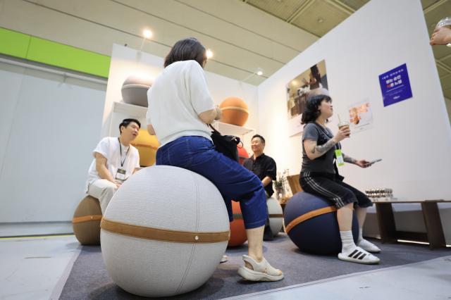 Visitors browse exhibition booths at THE MAISON 2026 a premium lifestyle fair held at COEX in Samseong-dong Gangnam-gu Seoul on June 26 2026 AJP Han Jun-gu