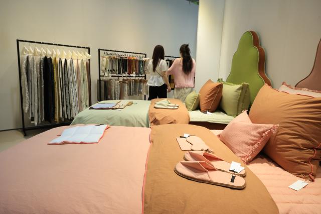 Visitors browse exhibition booths at THE MAISON 2026 a premium lifestyle fair held at COEX in Samseong-dong Gangnam-gu Seoul on June 26 2026 AJP Han Jun-gu