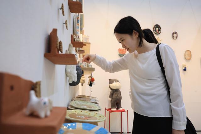 Visitors browse exhibition booths at THE MAISON 2026 a premium lifestyle fair held at COEX in Samseong-dong Gangnam-gu Seoul on June 26 2026 AJP Han Jun-gu