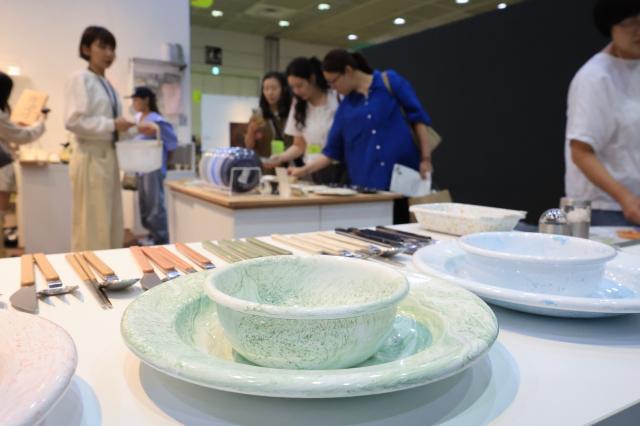 Visitors browse exhibition booths at THE MAISON 2026 a premium lifestyle fair held at COEX in Samseong-dong Gangnam-gu Seoul on June 26 2026 AJP Han Jun-gu