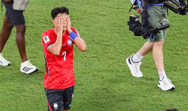 South Koreas Son Heung-min covers his face after a 1-0 loss to South Africa in a Group A match of the 2026 FIFA World Cup at Monterrey Stadium in Monterrey Mexico on June 24 2026 Yonhap