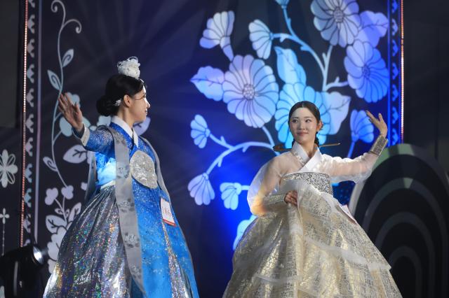 Two contestants perform on the runway in hanbok during the 12th Korea Hanbok Model Contest at Inspire Entertainment Resort in Incheon on June 27 2026 AJP Han Jun-gu