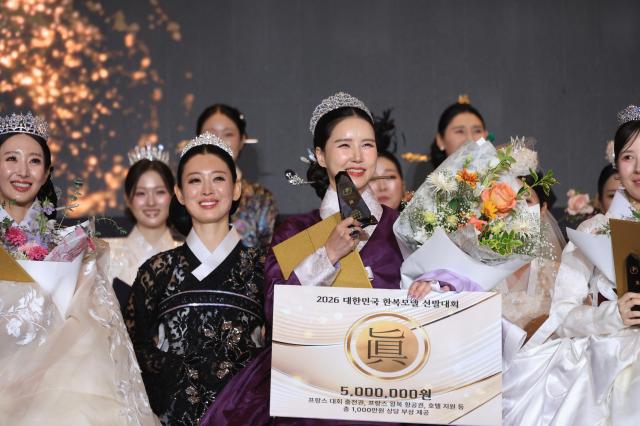 Award winners celebrate on stage during the 12th Korea Hanbok Model Contest in Incheon on June 27 2026 AJP Han Jun-gu