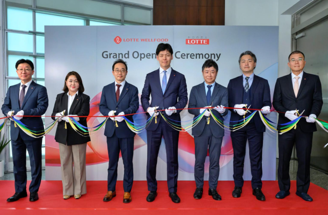 At the joint venture office opening ceremony in Singapore in May, representatives from both companies pose for a photo.
