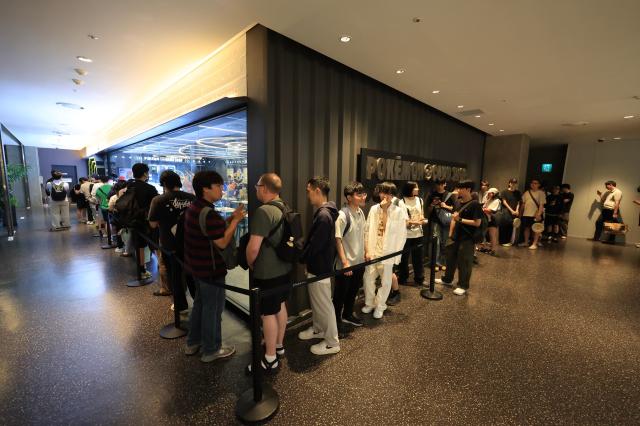 Visitors lined up to enter the official Pokémon card shop in Yongsan June 30 2026 AJP Han Jun-gu
