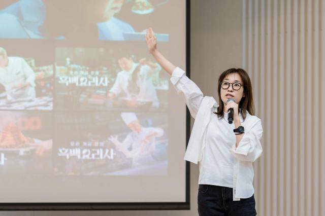 Director of product merchandising at Netflix Korea KangEe Lee speaks about the hit show Culinary Class Wars during the K-Culture Explained conference at Yonsei University Courtesy of Netflix 