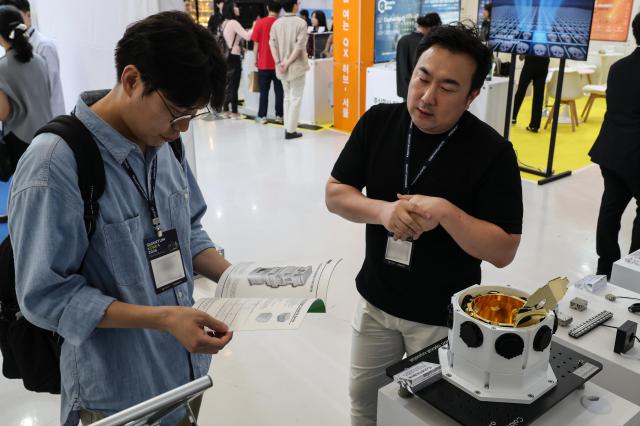 Visitors look around Quantum Korea 2026 at Dongdaemun Design Plaza DDP in Seoul on July 2 2026 AJP Yoo Na-hyun

