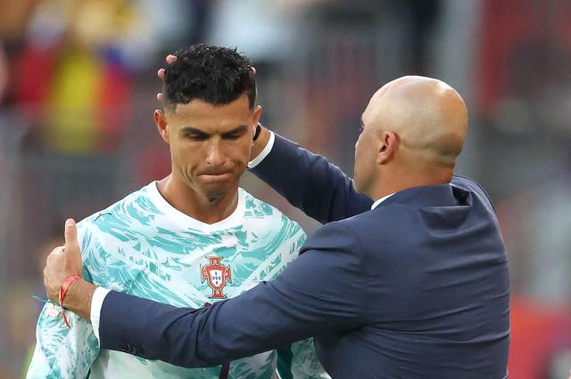 Cristiano Ronaldo and Portugal's head coach Roberto Martinez.